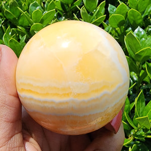 Elevated Calm Orange Calcite Sphere